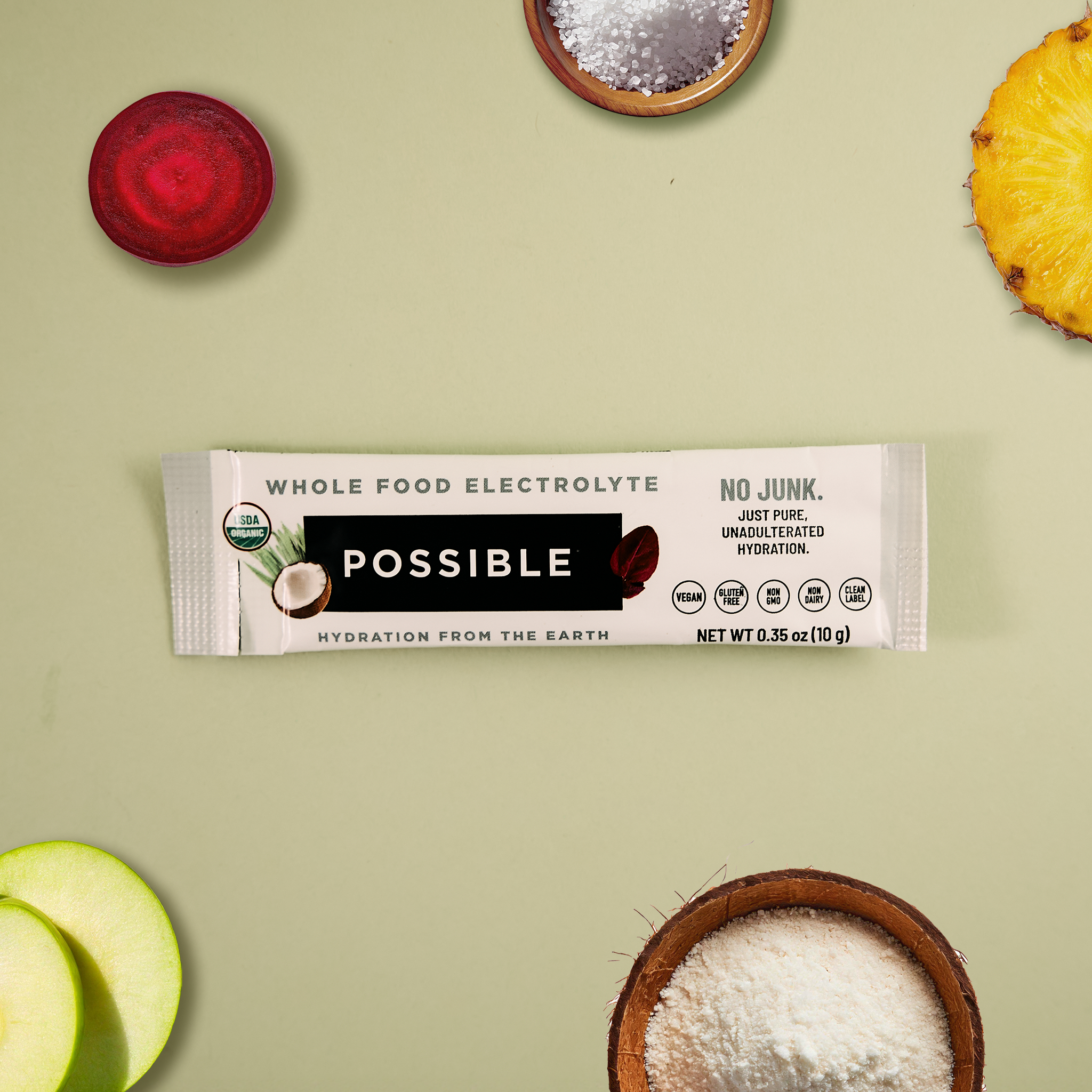 Whole food electrolyte bar with natural ingredients on a light green background