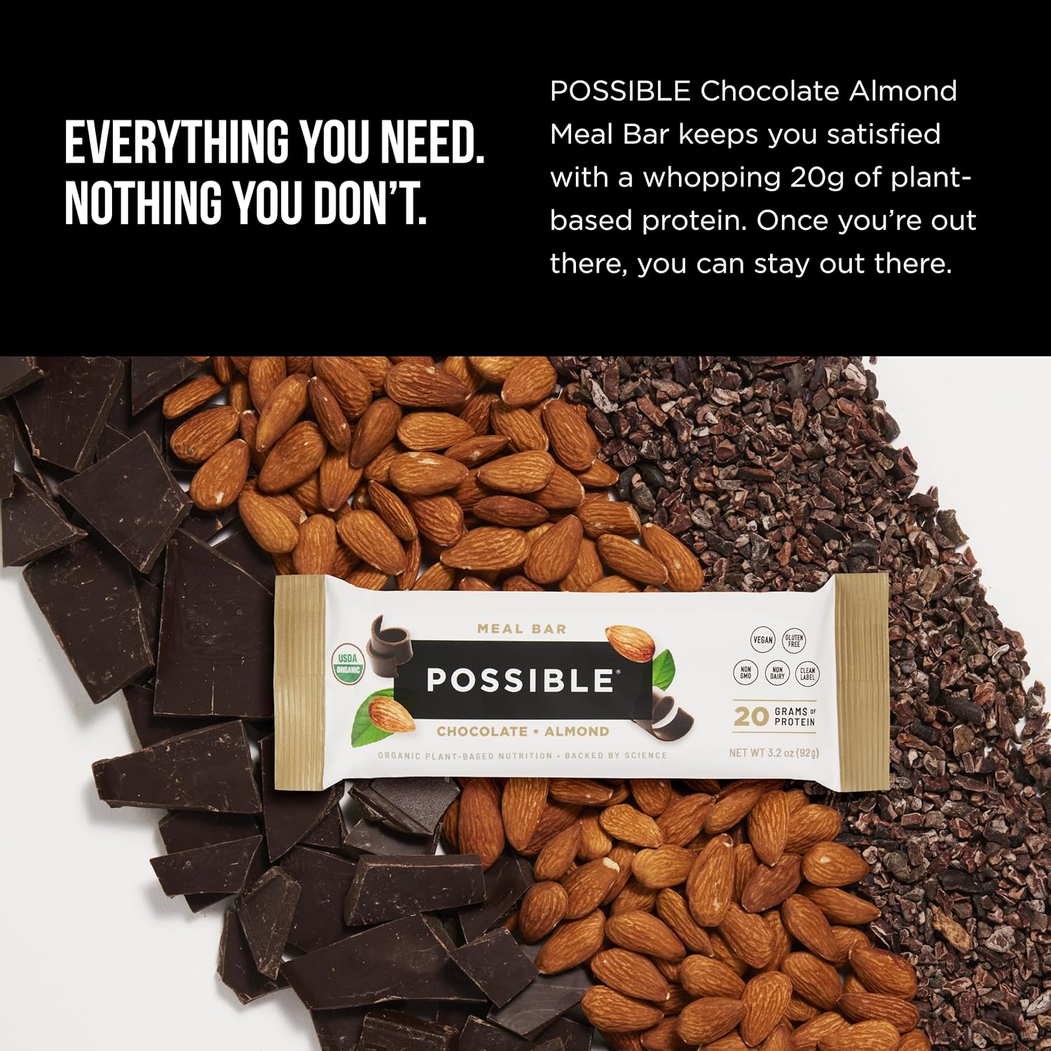 A promotional graphic with the text "Everything you need. Nothing you don’t." featuring the POSSIBLE meal bar on a bed of cocoa beans, emphasizing clean nutrition