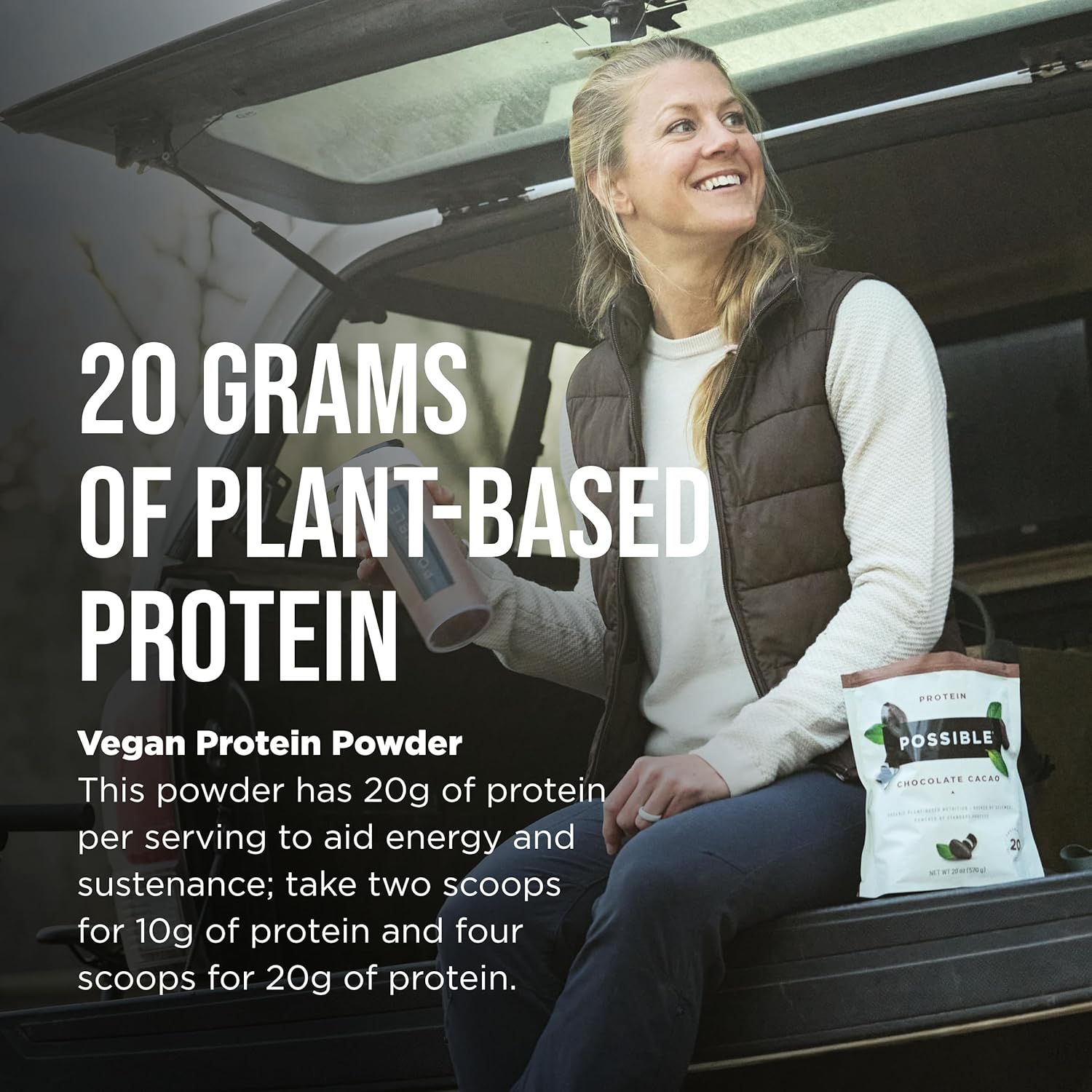 Active woman holding Possible Plant-Based Protein Powder outdoors, highlighting its nutritional benefits for fitness and health